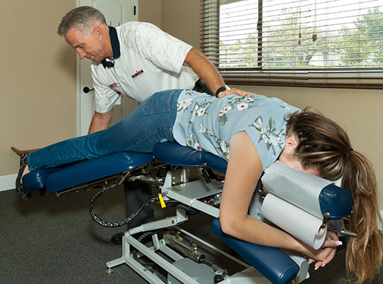 Chiropractor San Diego CA William Porath Prepping Adjustment